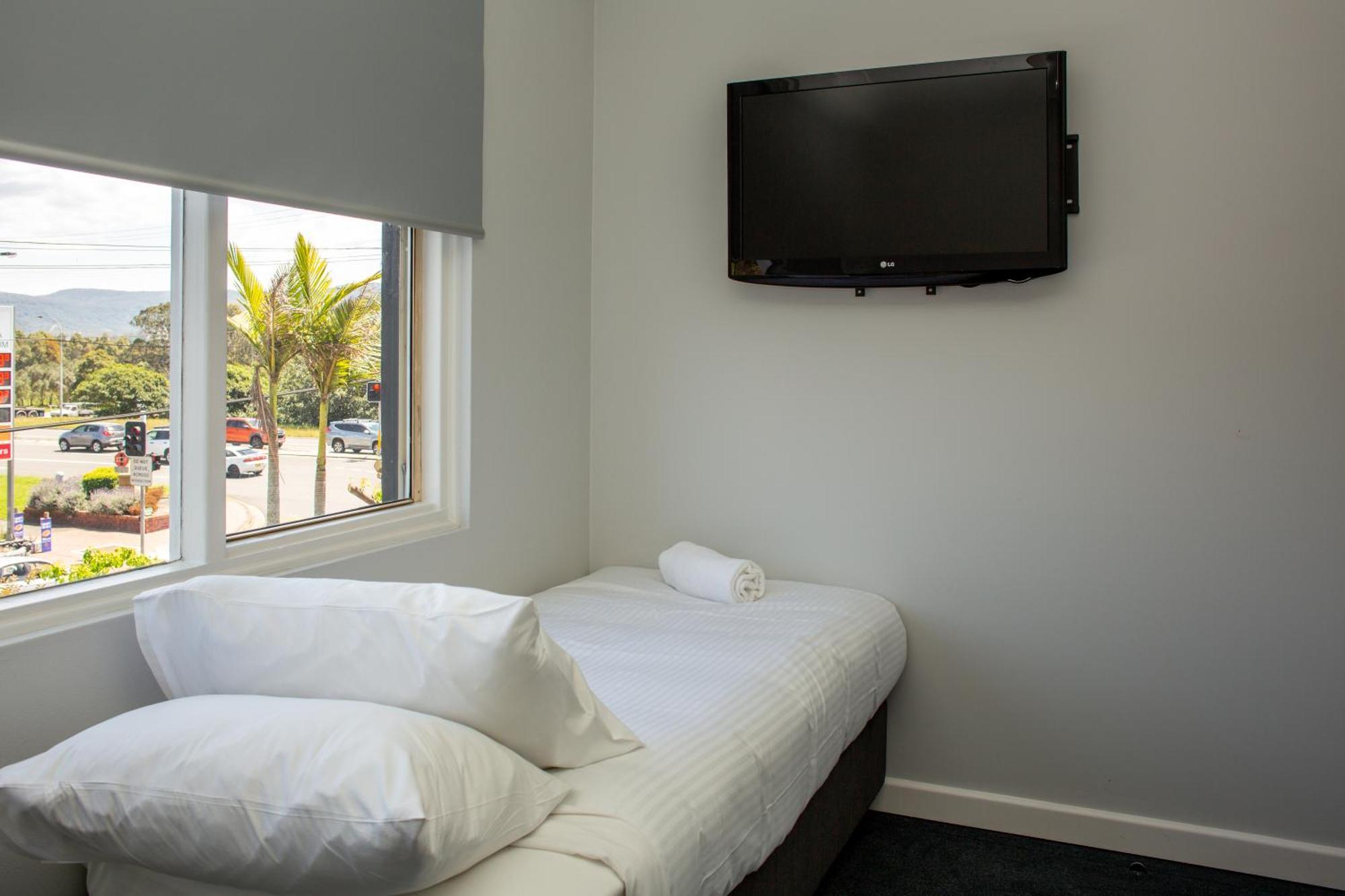Five Island Hotel Cringila Zimmer foto
